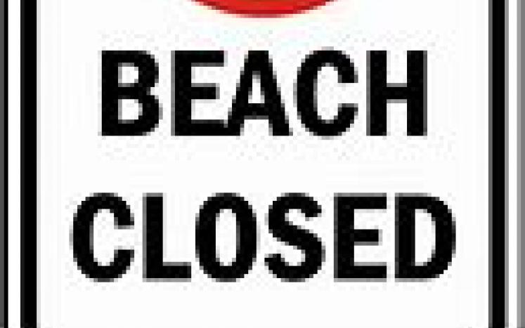 beach closed sign